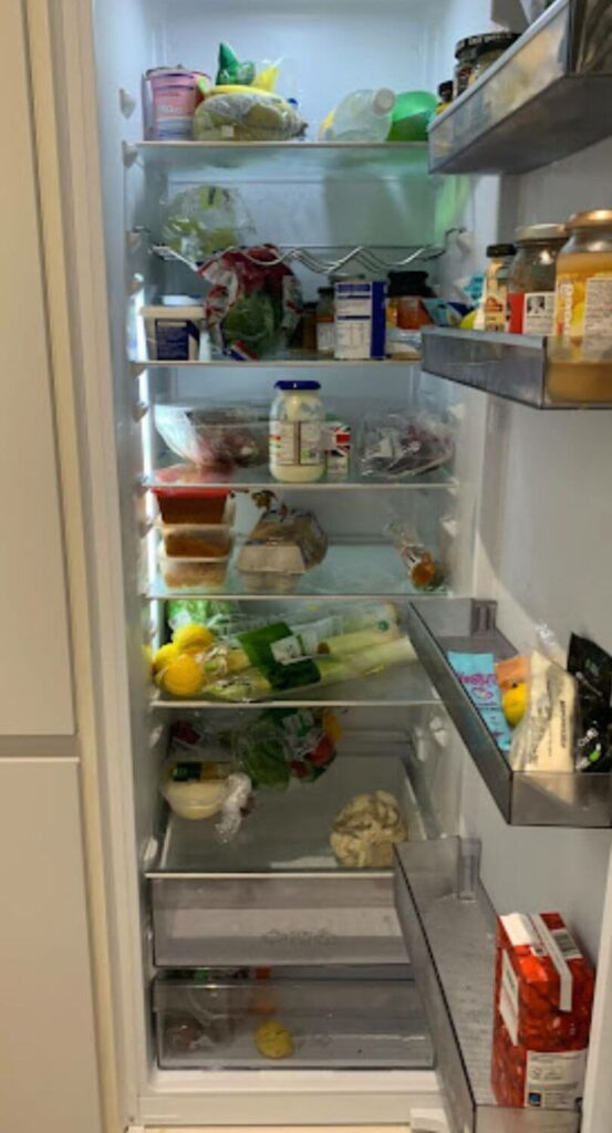 Picture of fridge full of food & drinks